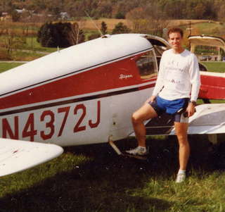 53 01k. Dave Parker and N4372J (zoom) at Penns Cave