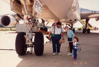 Mike Bird, Gloria Rosenberg, and Antonia under a 747