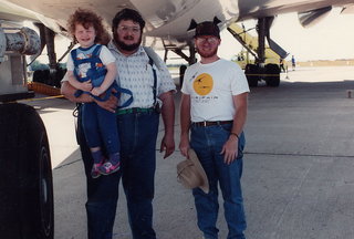 Antonia, Mike Bird, and Adam under a big airplane