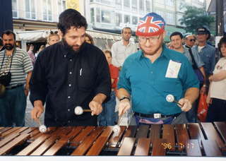 Alex Jacobowitz and Adam playing a xylophone