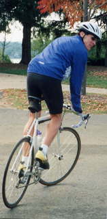 700 2w1. Shore AC XC 1997 -- Kevin Parks riding away