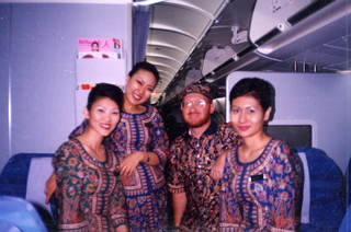 Adam and Singapore Air flight attendents