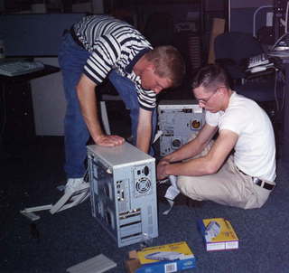 Provar guys fixing a computer