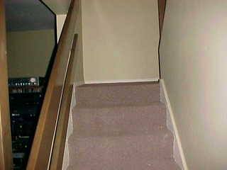 Up the stairs to the landing.