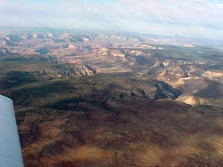 125 54m. North Rim of the Grand Canyon with cloud shadows 2 -- aerial