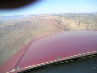Echo Cliffs over airplane nose - aerial