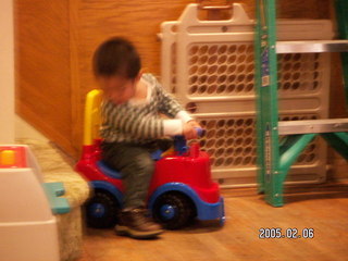 1247 5c6. Gaby checking for a flat tire