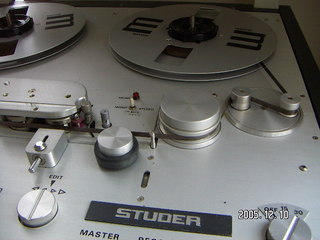 reel-to-reel tapes on shelves