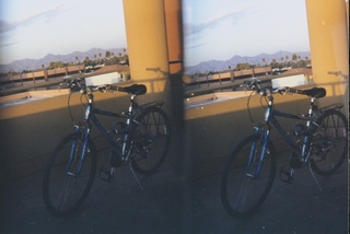 stereo-3D L+R parallel-eye Loreo -- view from Galleria terrace -- my bicycle