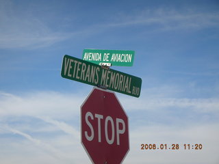 Eakins Cemetary and Clark Airfield Road sign with windsock