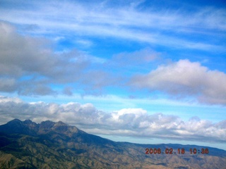 1664 5qj. aerial -- Four Peaks in clouds