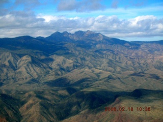 1665 5qj. aerial -- Four Peaks in clouds