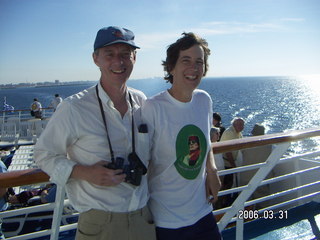 -- friends on deck with a Qadhafi t-shirt