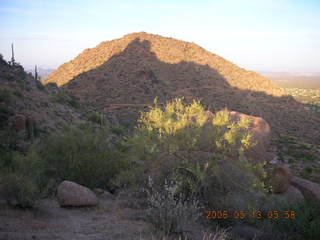 3 5td. shadow of Pinnacle Peak at sunrise