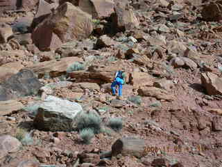 Canyonlands -- Lathrop Trail -- Adam hiking uphill