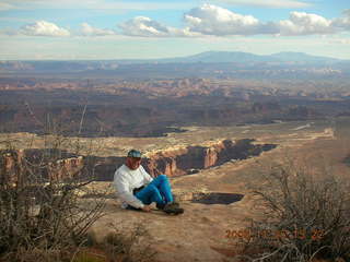 Canyonlands -- Lathrop Trail -- Adam hiking uphill