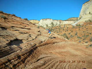 Plateau Point -- Mighty Colorado River -- Adam on rock ledge