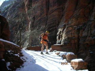 Zion National Park -- Adam slip-sliding down Walter's Wiggles