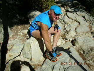 440 61t. Zion National Park - Observation Point hike - Adam putting on crampons