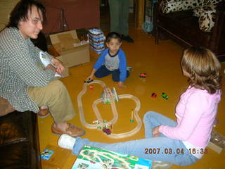 261 634. Gaby's fourth birthday -- Ivan, Gaby, Jenny, trains