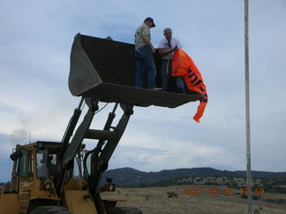 Young -- Chapman Ranch Airport - loader raising Arv and Bob for wind sock replacement