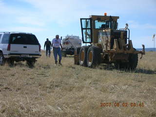 Young -- Chapman Ranch Airport - loader raising Arv and Bob for wind sock replacement