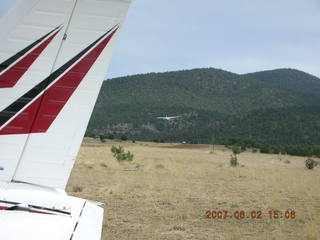 Young -- Chapman Ranch Airport - Brian and Sherry taking off - tail of N4372J