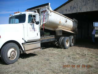 Young -- Chapman Ranch Airport - dump truck in the hangar