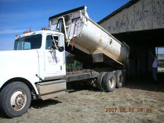 Young -- Chapman Ranch Airport - dump truck in the hangar