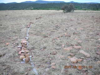 Young -- Chapman Ranch Airport - wind sock circle in rocks