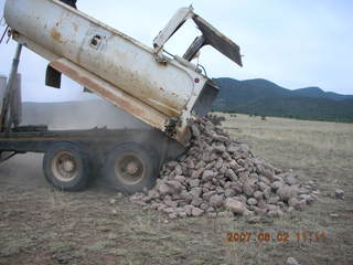 Young -- Chapman Ranch Airport - dump truck in the hangar