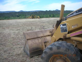 Young -- Chapman Ranch Airport - dump truck in the hangar