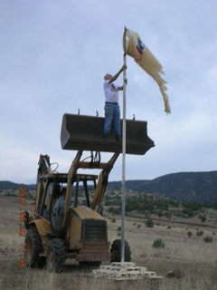 Young -- Chapman Ranch Airport - Arv on loader working on wind sock