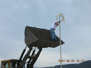 Young -- Chapman Ranch Airport - Arv on loader working on wind sock