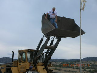 Young -- Chapman Ranch Airport - Arv on loader working on wind sock