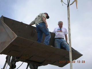 Young -- Chapman Ranch Airport - Arv and Bob on loader working on wind sock