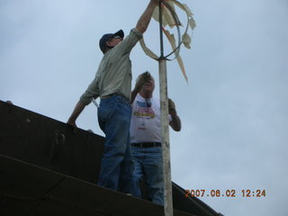 Young -- Chapman Ranch Airport - Arv on loader working on wind sock