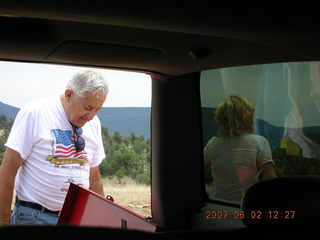 Young -- Chapman Ranch Airport - Arv on loader working on wind sock