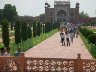 Taj Mahal patterened walkway wall, entrance in distance