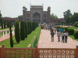Taj Mahal patterened walkway wall, entrance in distance