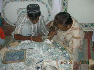193 69e. Agra - craftsmen making inlaid marble