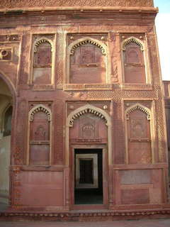 Agra Fort - intricate wall carved in sandstone