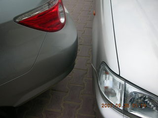 Pramod's new car verrrry close to another