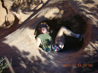Arches National Park - Devils Garden hike- Adam in hole in rock