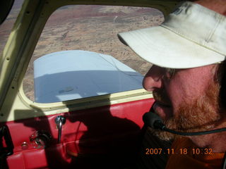 154 6bj. Adam flying N4372J over Utah landscape