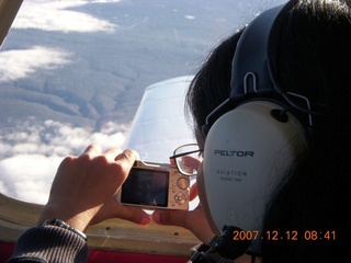 840 6cc. Grand Canyon aerial with clouds - Aditi taking a picture