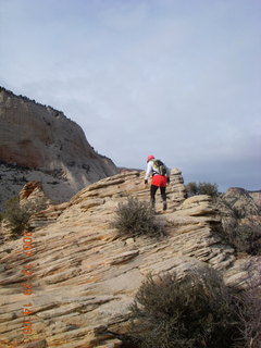 83 6cv. Zion National Park - Angels Landing hike - Adam climbing at the top
