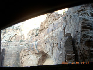 419 6cw. Zion National Park - driving on the road - view from tunnel
