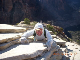 141 6cx. Zion National Park - sunrise Angels Landing hike - Adam hanging on