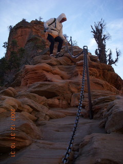 143 6cx. Zion National Park - sunrise Angels Landing hike - Adam climbing down chains